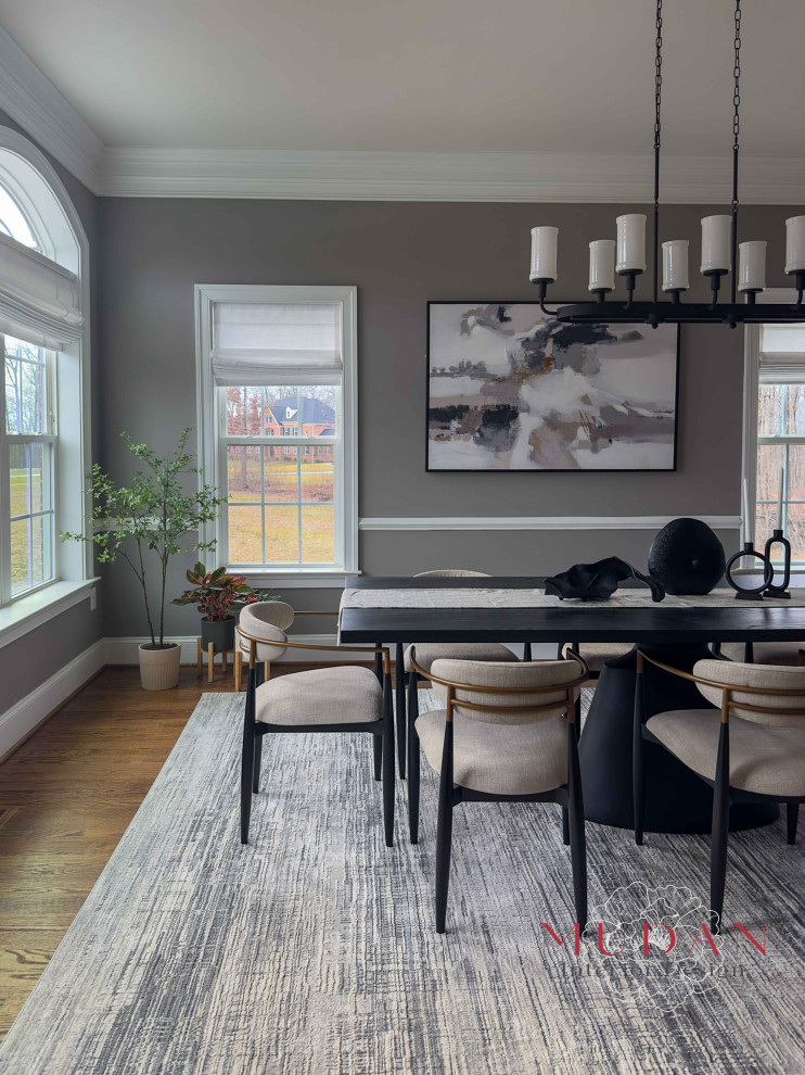 Large transitional medium tone wood floor and brown floor kitchen/dining room combo photo with gray walls