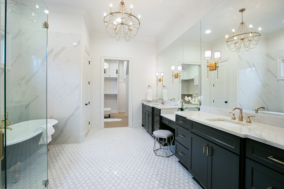 Design ideas for a large classic ensuite bathroom in New Orleans with raised-panel cabinets, grey cabinets, a freestanding bath, a built-in shower, a one-piece toilet, multi-coloured tiles, ceramic tiles, white walls, light hardwood flooring, a submerged sink, quartz worktops, multi-coloured floors, a hinged door, grey worktops, an enclosed toilet and double sinks.