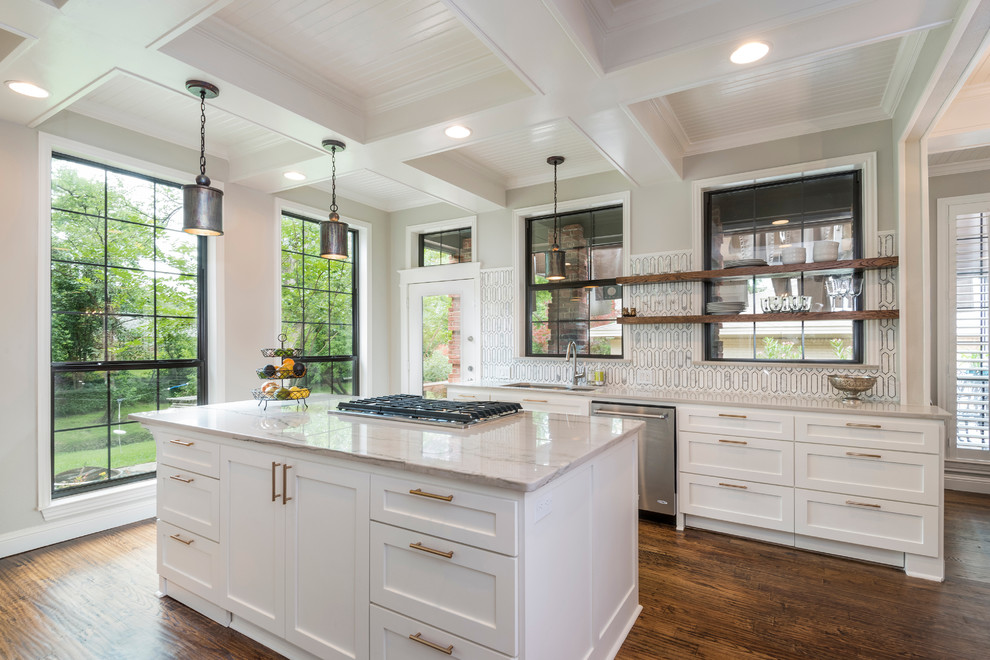 Transitional kitchen in Dallas with white cabinets, stainless steel appliances, dark hardwood floors, with island, an undermount sink, shaker cabinets and multi-coloured splashback.