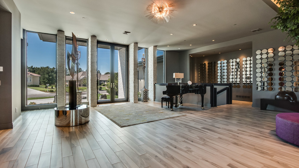 Expansive contemporary foyer in Denver with grey walls, a double front door, ceramic floors and a metal front door.