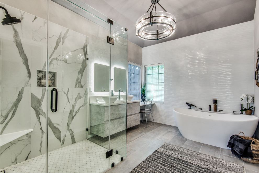Mid-sized transitional master white tile porcelain tile, gray floor, double-sink and vaulted ceiling bathroom photo in Dallas with flat-panel cabinets, gray cabinets, a two-piece toilet, gray walls, a vessel sink, quartz countertops, a hinged shower door, white countertops, a niche and a floating vanity