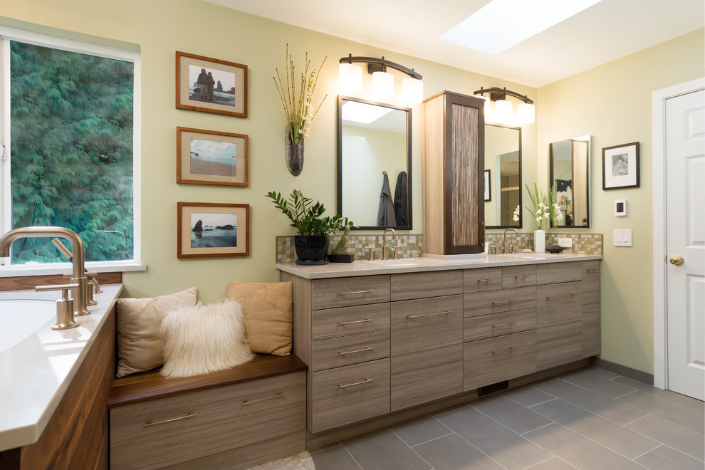 Inspiration for a large asian master bathroom in Other with flat-panel cabinets, grey cabinets, a japanese tub, green tile, mosaic tile, green walls, porcelain floors, an undermount sink, engineered quartz benchtops, grey floor, an alcove shower, a sliding shower screen and white benchtops.