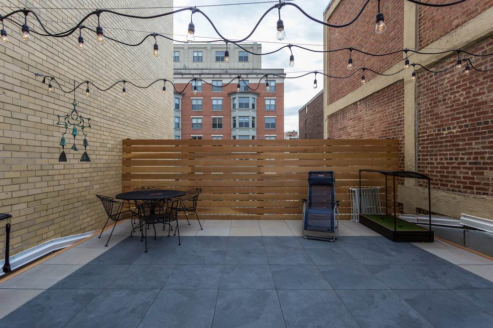 Small modern rooftop deck in DC Metro with no cover.