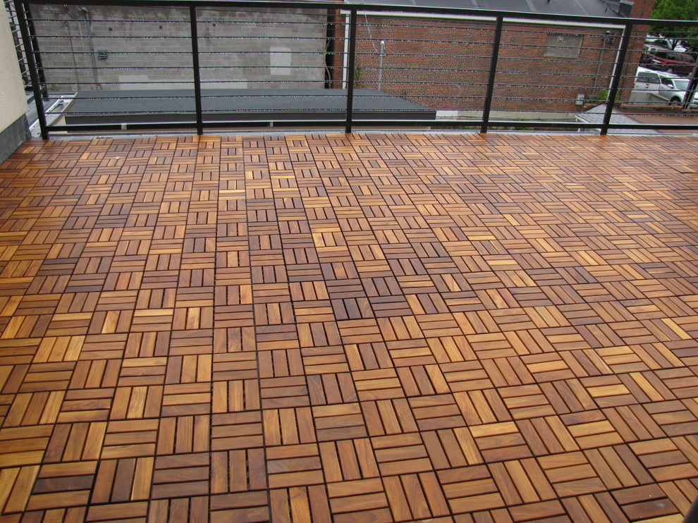 Mid-sized transitional rooftop deck photo in Denver