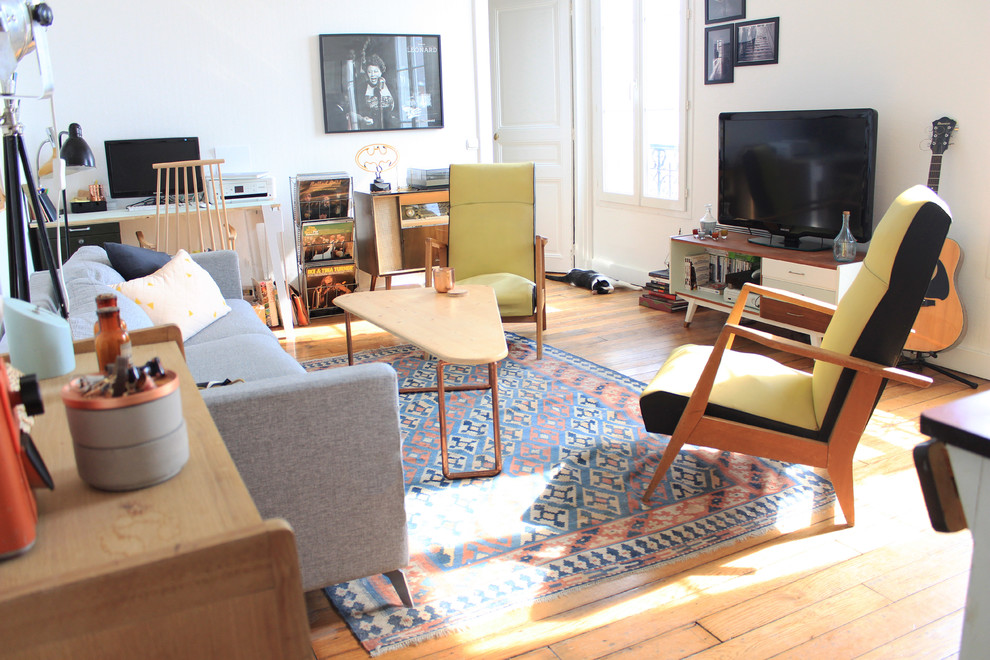 Idée de décoration pour une salle de séjour vintage.