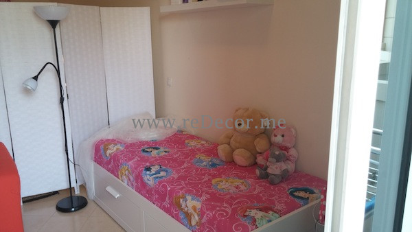Example of a small trendy kids' room design with white walls