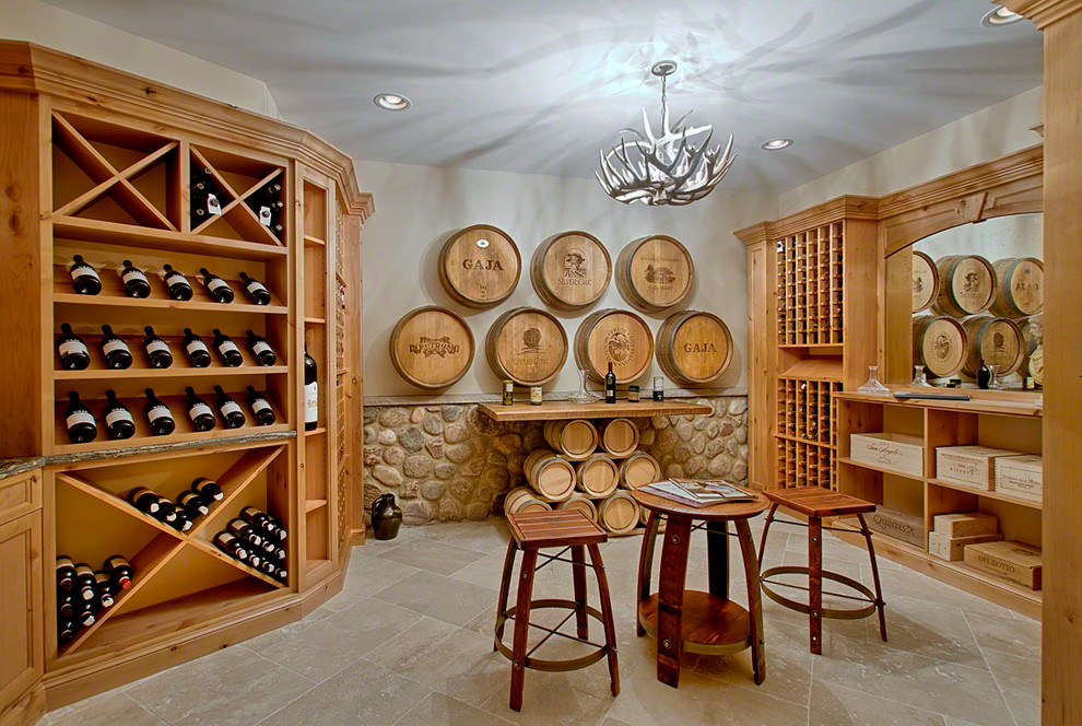 Inspiration for a mid-sized country wine cellar in Chicago with travertine floors and storage racks.