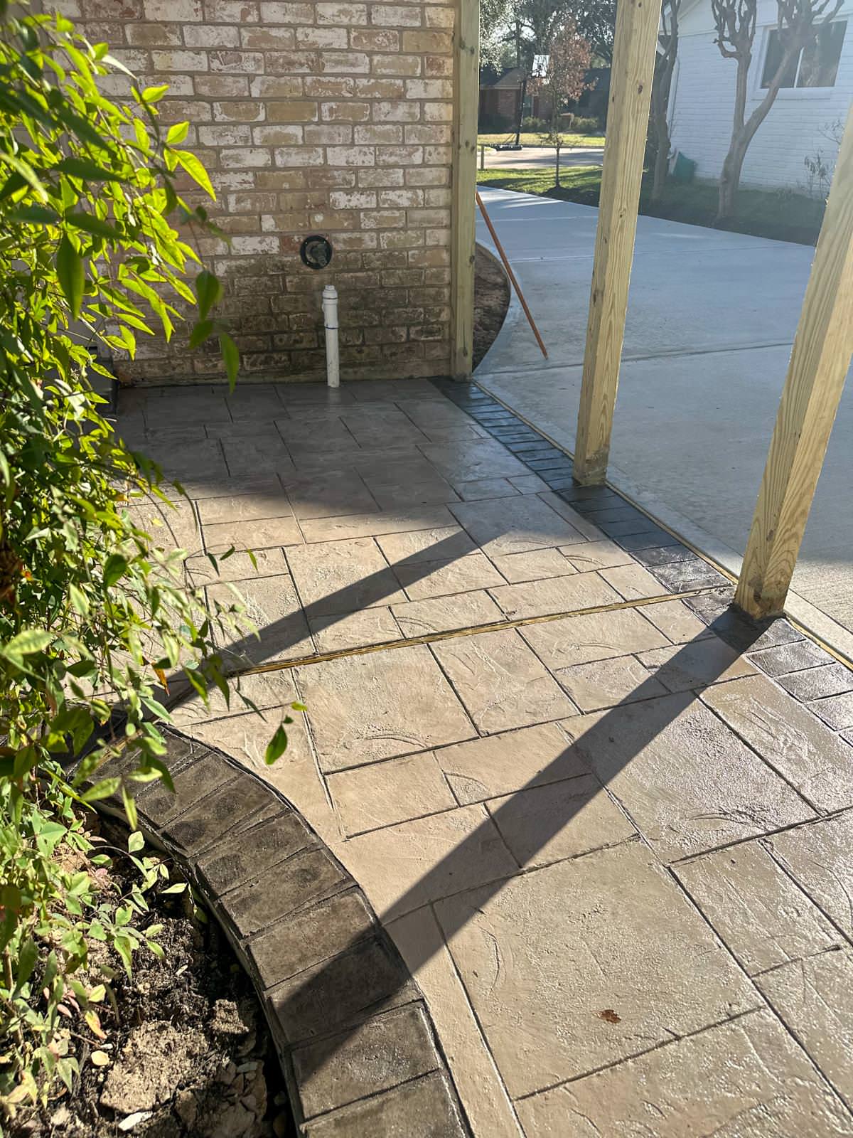 New driveway with sidewalks and stamped concrete!