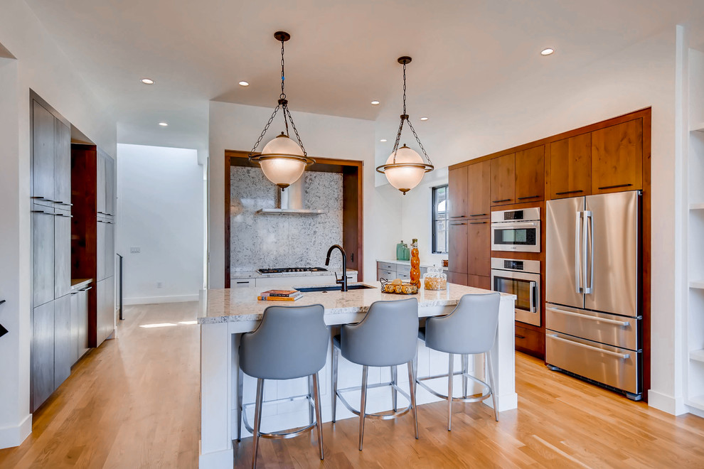 Example of a transitional kitchen design in Denver