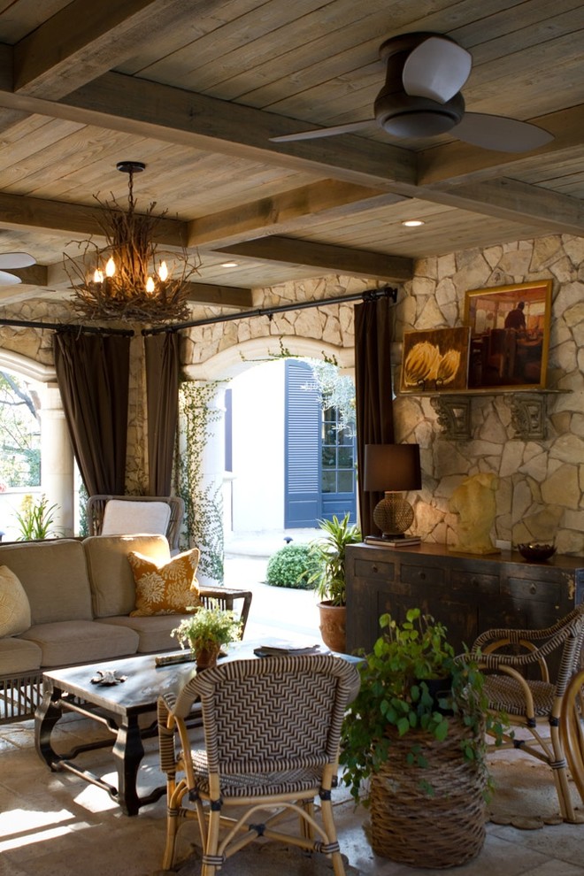 Inspiration for a country patio in Los Angeles with a roof extension.