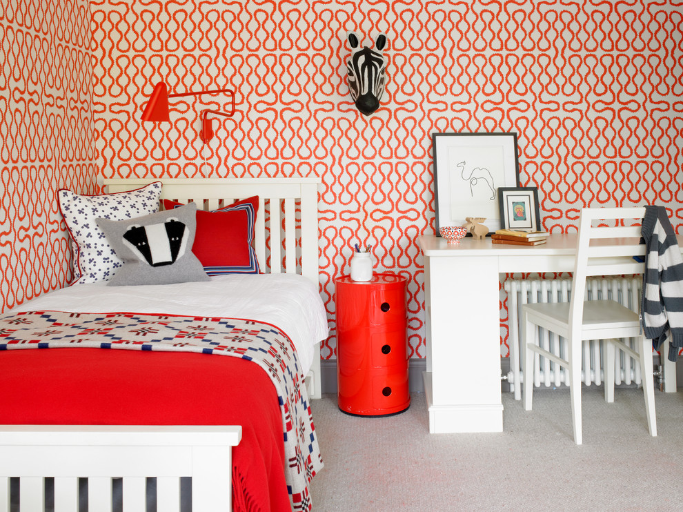 This is an example of a transitional gender-neutral kids' bedroom for kids 4-10 years old in Other with multi-coloured walls, carpet and grey floor.