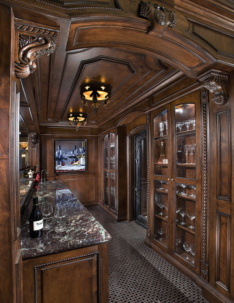 Traditional kitchen in Phoenix with dark wood cabinets.