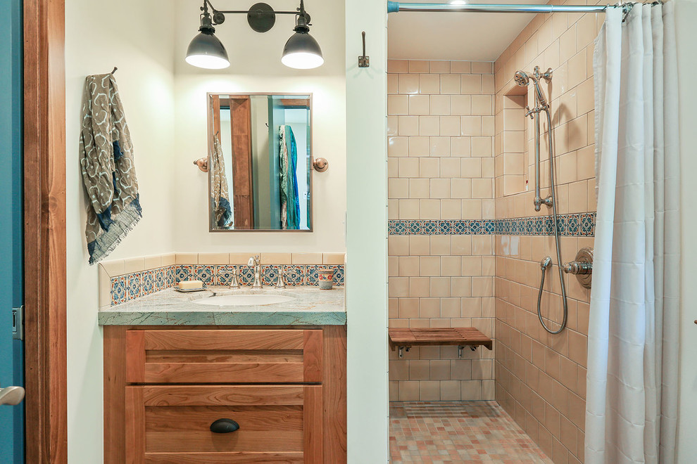 Photo of a small transitional master bathroom in San Francisco with shaker cabinets, medium wood cabinets, a curbless shower, beige tile, ceramic tile, an undermount sink, quartzite benchtops, a shower curtain and multi-coloured benchtops.