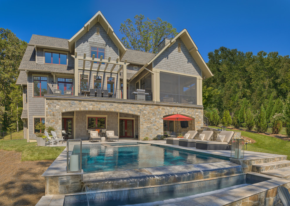 Example of a transitional home design design in Charlotte