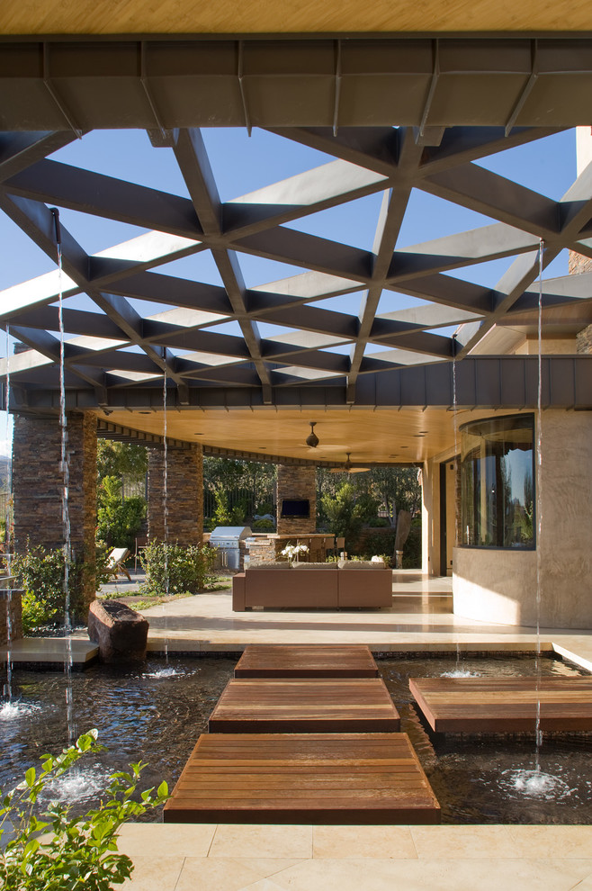 Design ideas for a contemporary patio in Las Vegas with a water feature.