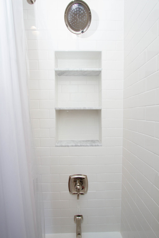 Large transitional master white tile and ceramic tile alcove bathtub photo