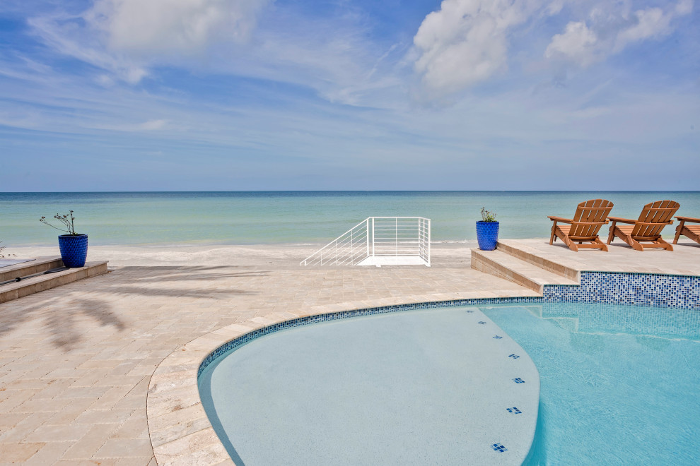 Luxury Beachfront Pool and Spa at Sunset - Beach Style - Pool - Tampa ...