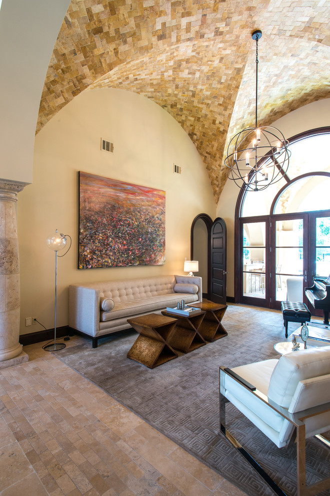 Photo of a mediterranean formal enclosed living room in Houston with beige walls.