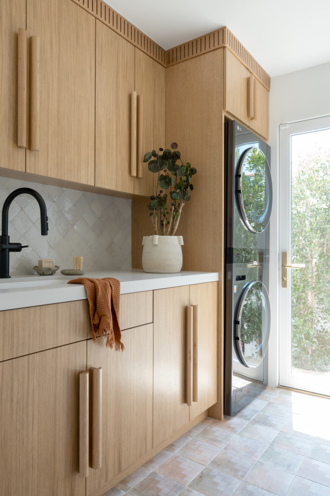 Design ideas for a beach style utility room in Los Angeles.