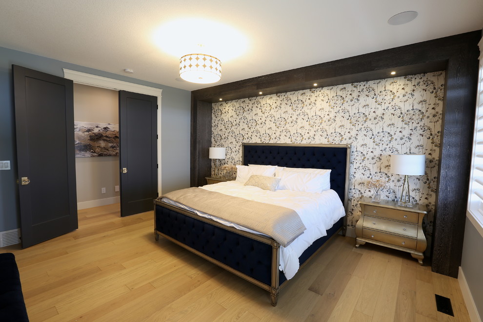 This is an example of a mid-sized modern master bedroom in Other with grey walls, light hardwood floors, no fireplace and beige floor.