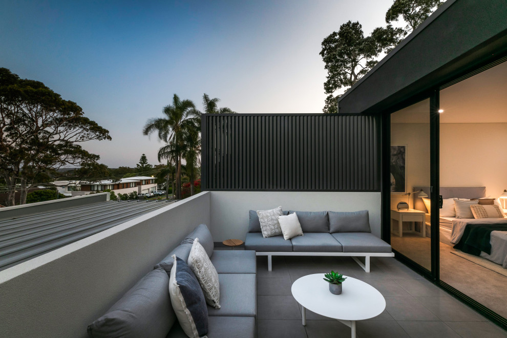 This is an example of a contemporary balcony in Sydney with no cover.