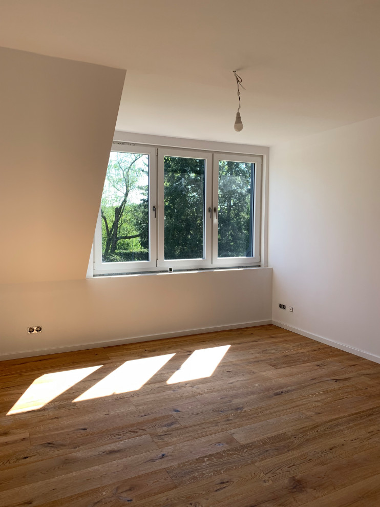 Modernisierung Einfamilienhaus mit Erweiterung der Gauben und  Fensteraufteilung