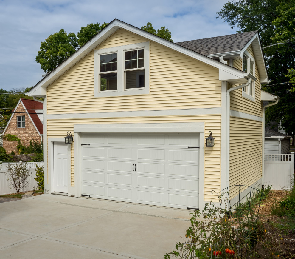 This is an example of a medium sized country detached double garage workshop in Chicago.