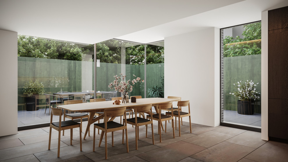 Ispirazione per una sala da pranzo aperta verso la cucina design di medie dimensioni con pareti bianche, pavimento con piastrelle in ceramica e pavimento nero