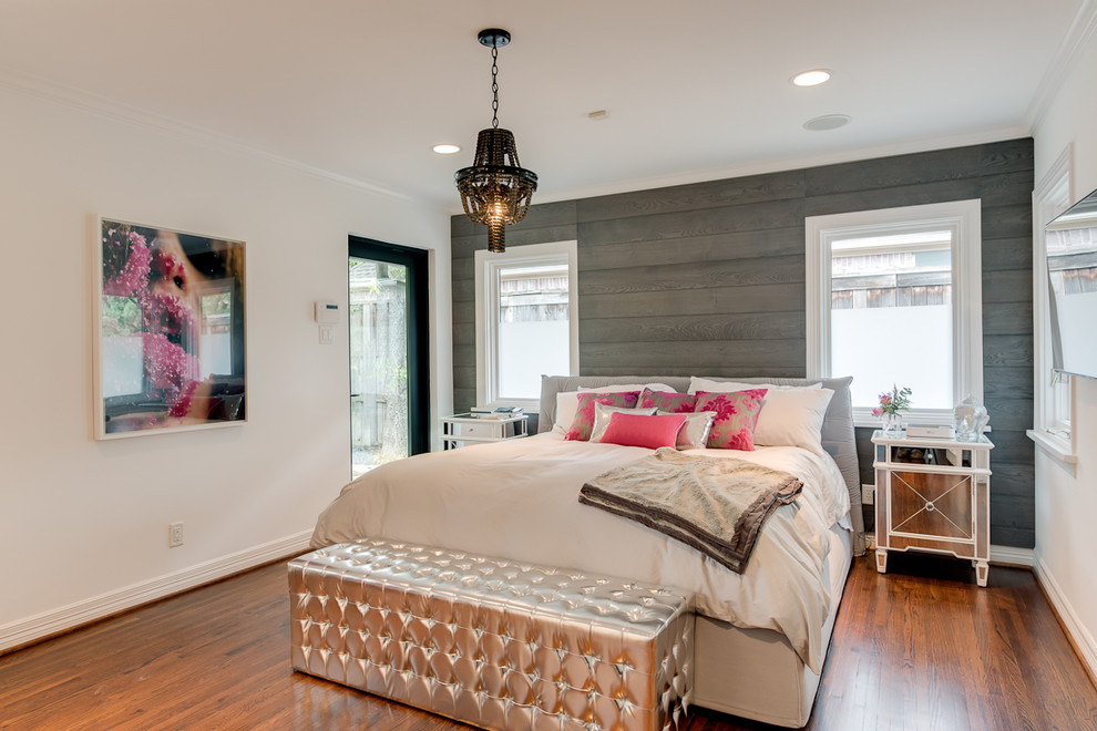 Design ideas for a contemporary bedroom in Los Angeles with white walls and medium hardwood floors.