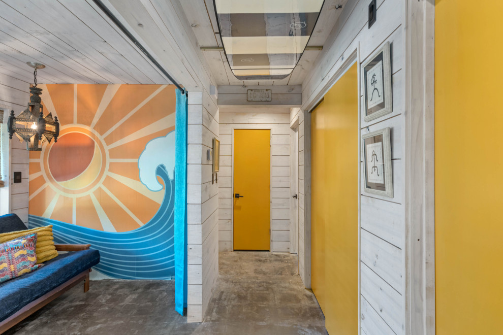 This is an example of a beach style hallway in Houston.