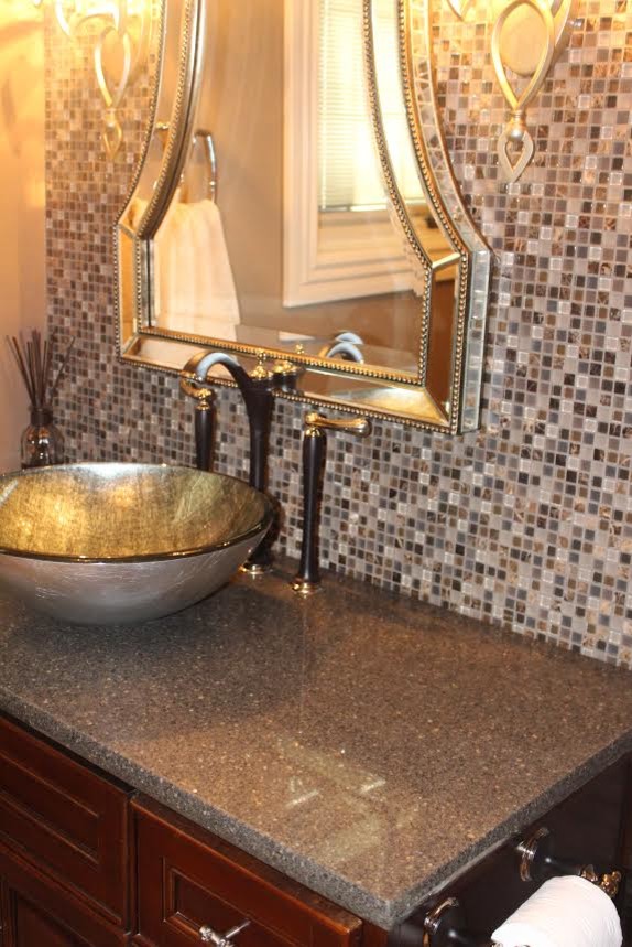 Bathroom - mid-sized transitional 3/4 beige tile and mosaic tile mosaic tile floor bathroom idea with a vessel sink and quartz countertops