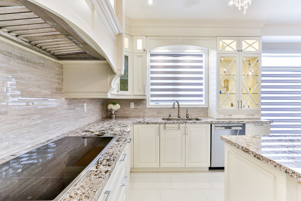 Example of a transitional kitchen design in Toronto