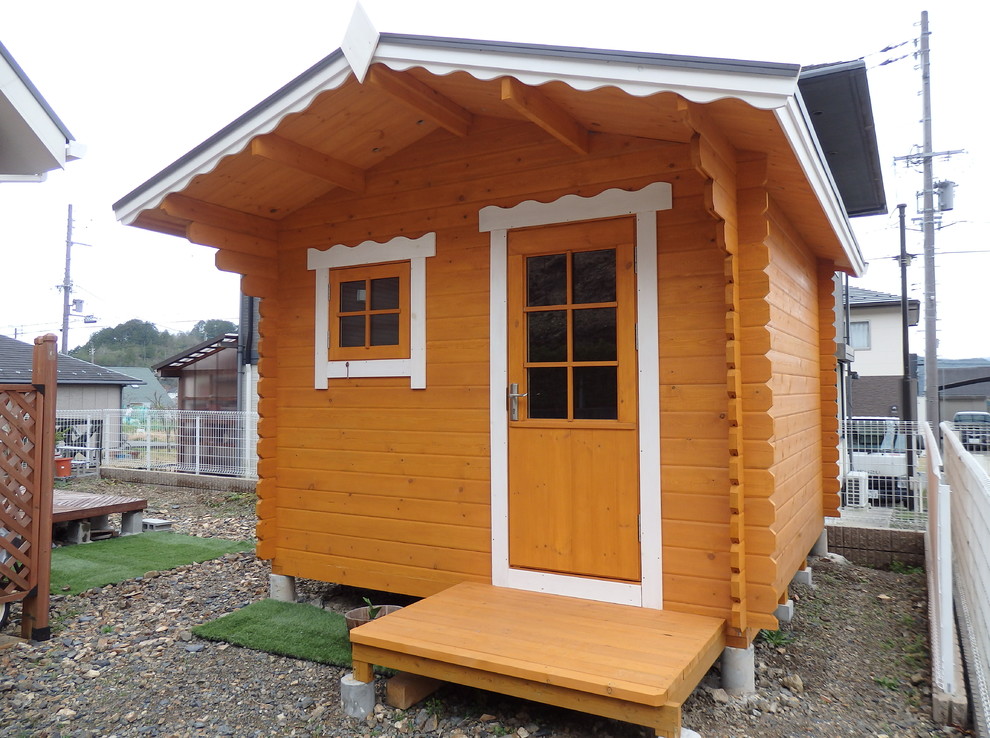 This is an example of a scandinavian garden shed in Other.