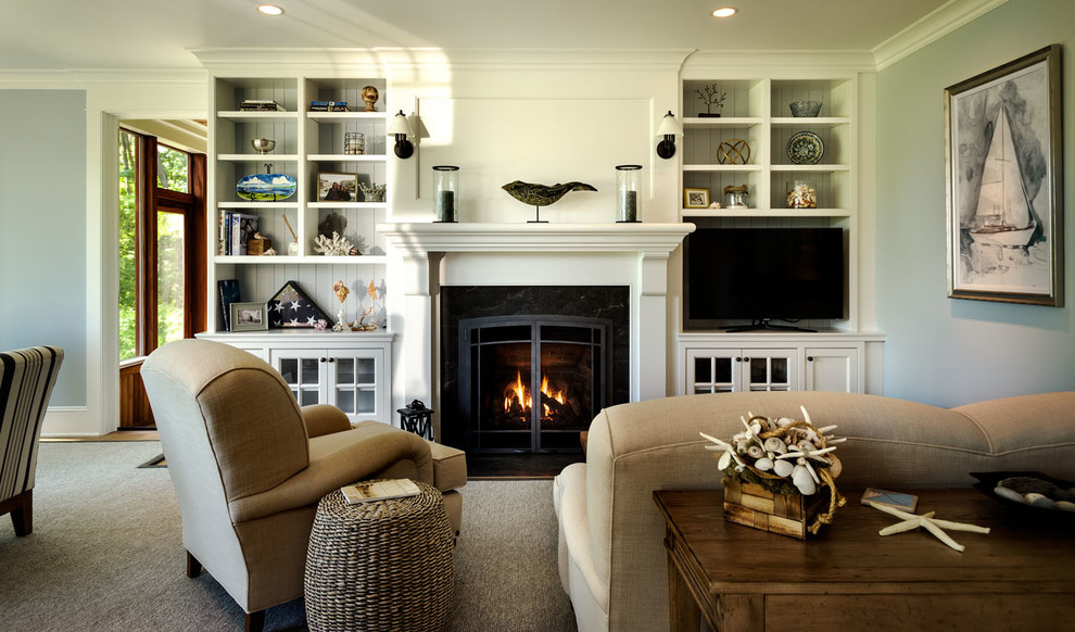 Inspiration for a mid-sized beach style formal open concept living room in Boston with grey walls, carpet, a standard fireplace, a tile fireplace surround, a freestanding tv and grey floor.