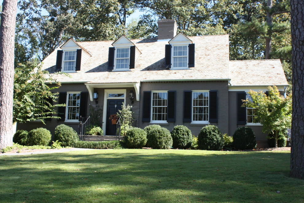 Inspiration for a large traditional two-storey brick grey exterior in Atlanta.