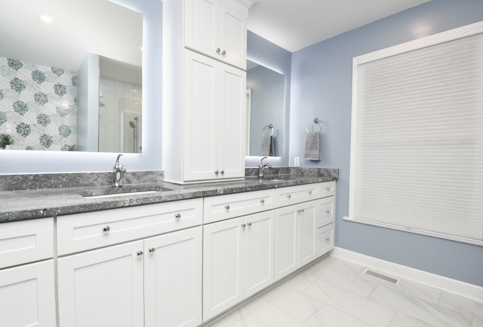 Inspiration for a large beach style master bathroom in DC Metro with recessed-panel cabinets, white cabinets, a corner shower, quartzite benchtops, a sliding shower screen, multi-coloured benchtops, a shower seat, a double vanity and a built-in vanity.