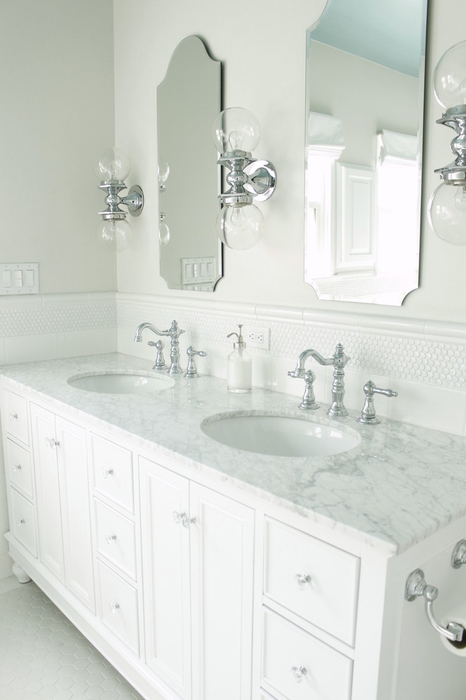 Mid-sized traditional master bathroom in Los Angeles with shaker cabinets, white cabinets, marble benchtops, a claw-foot tub, white tile, porcelain tile, grey walls and mosaic tile floors.