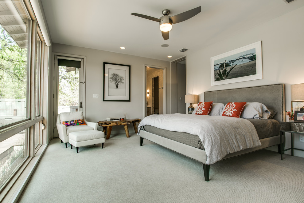 Photo of a country master bedroom in Dallas with grey walls, carpet and no fireplace.
