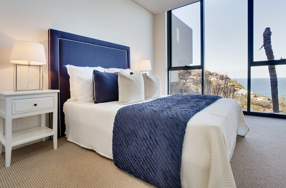 Photo of a beach style bedroom in Sydney.