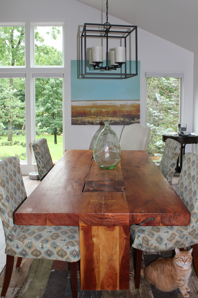 Example of a country dining room design in Other