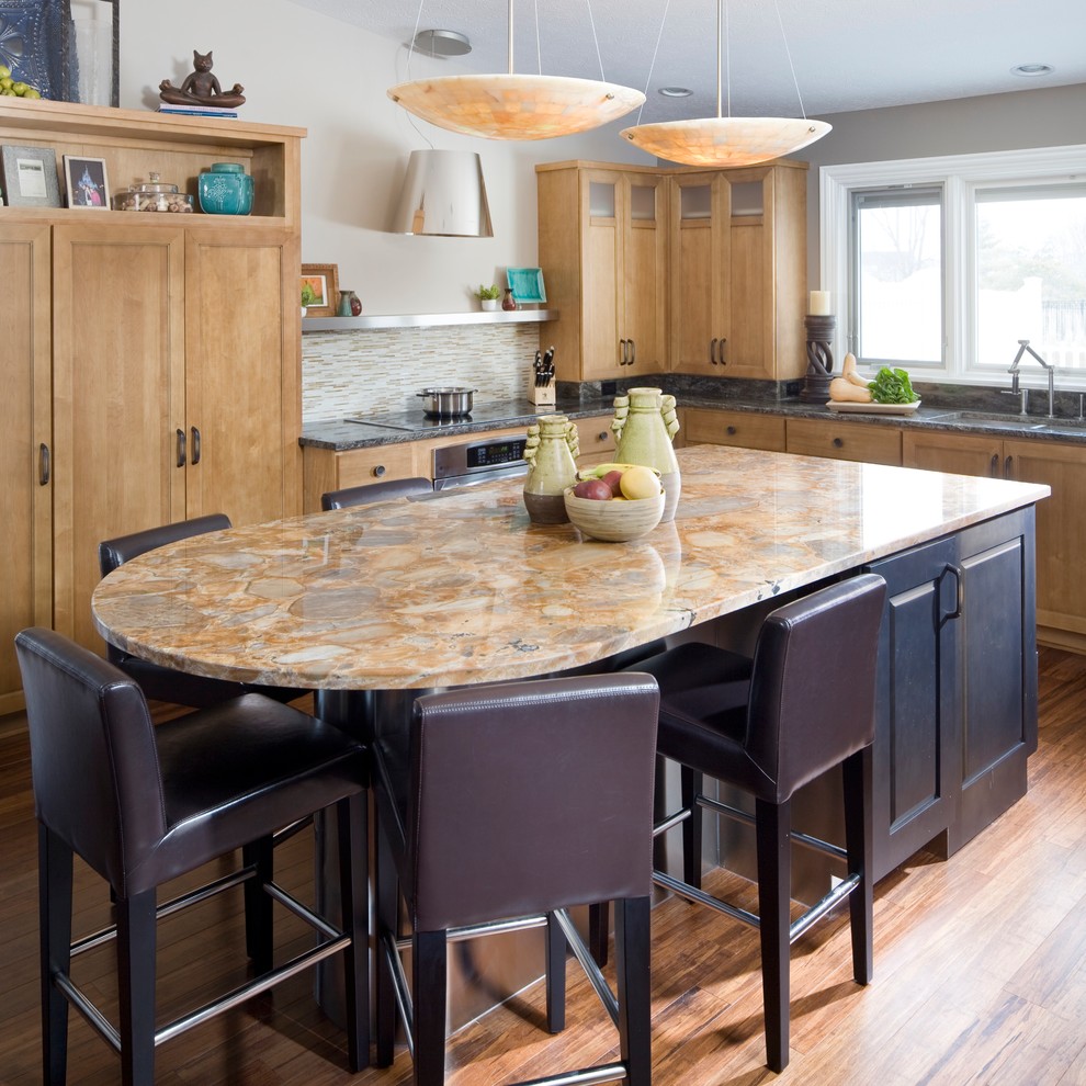 Example of a transitional medium tone wood floor kitchen design in Indianapolis with a drop-in sink, granite countertops, multicolored backsplash, an island and light wood cabinets