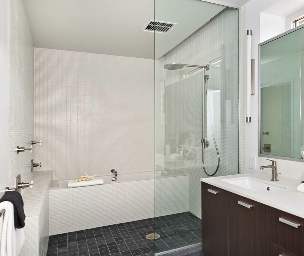 Mid-sized modern bathroom in San Francisco with an open shower, flat-panel cabinets, dark wood cabinets, white tile, white walls, an undermount sink, an open shower and a shower seat.