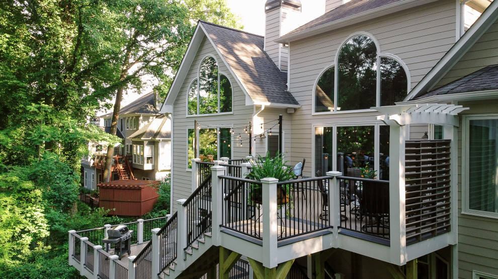Inspiration for a large backyard metal railing deck remodel in Atlanta with no cover