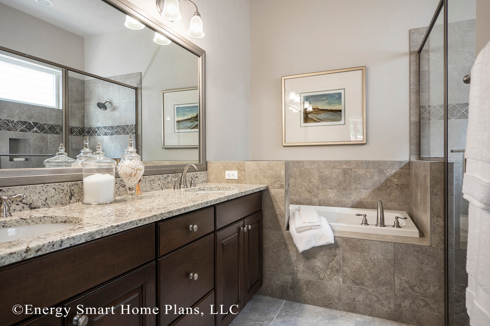 Inspiration for a small arts and crafts bathroom in Orlando with an undermount sink, raised-panel cabinets, medium wood cabinets, granite benchtops, a drop-in tub, a corner shower, a one-piece toilet, beige tile, ceramic tile, beige walls and travertine floors.