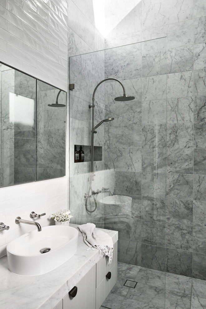 Inspiration for a mid-sized contemporary master bathroom in Sydney with grey cabinets, marble, marble floors, a vessel sink, marble benchtops, an open shower, grey benchtops, flat-panel cabinets, a curbless shower, gray tile and grey floor.