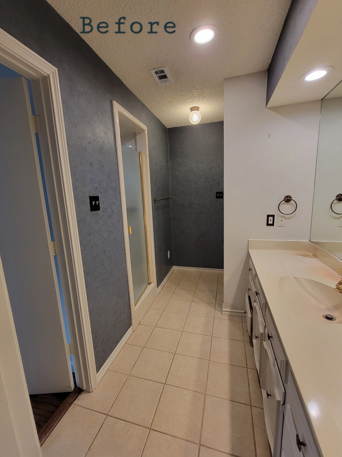 Two separate bathrooms converted into a master bathroom with a big open closet