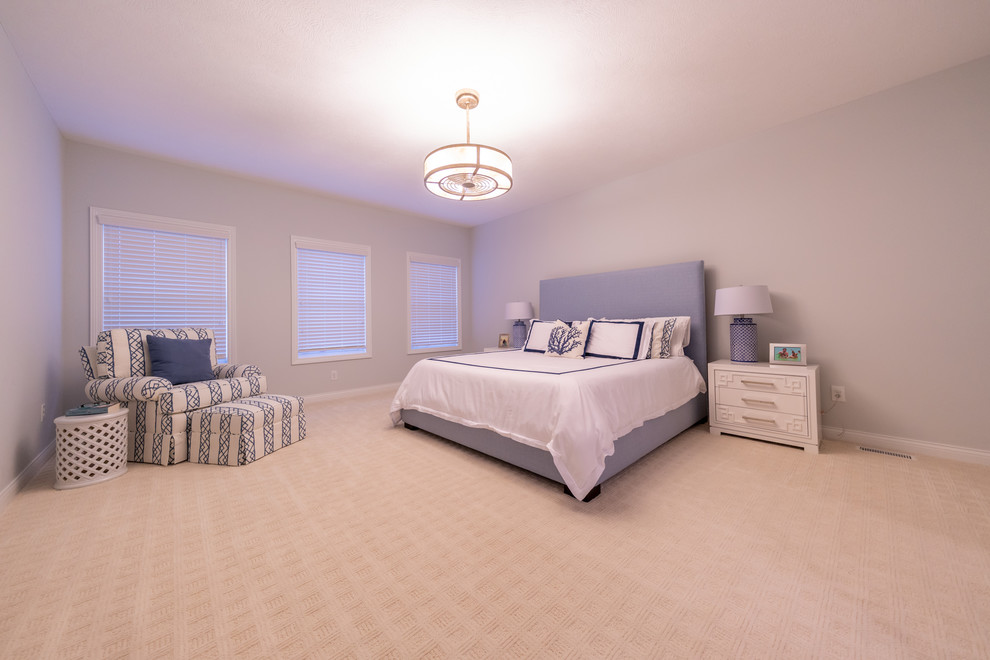 Example of a transitional bedroom design in Cleveland