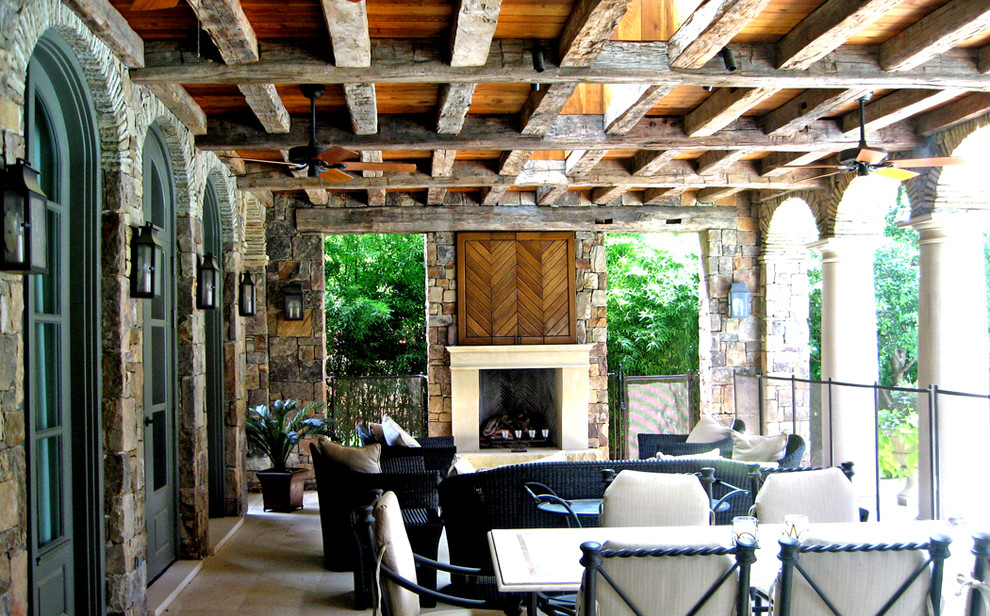 Inspiration for a traditional patio in Dallas with a fire feature.