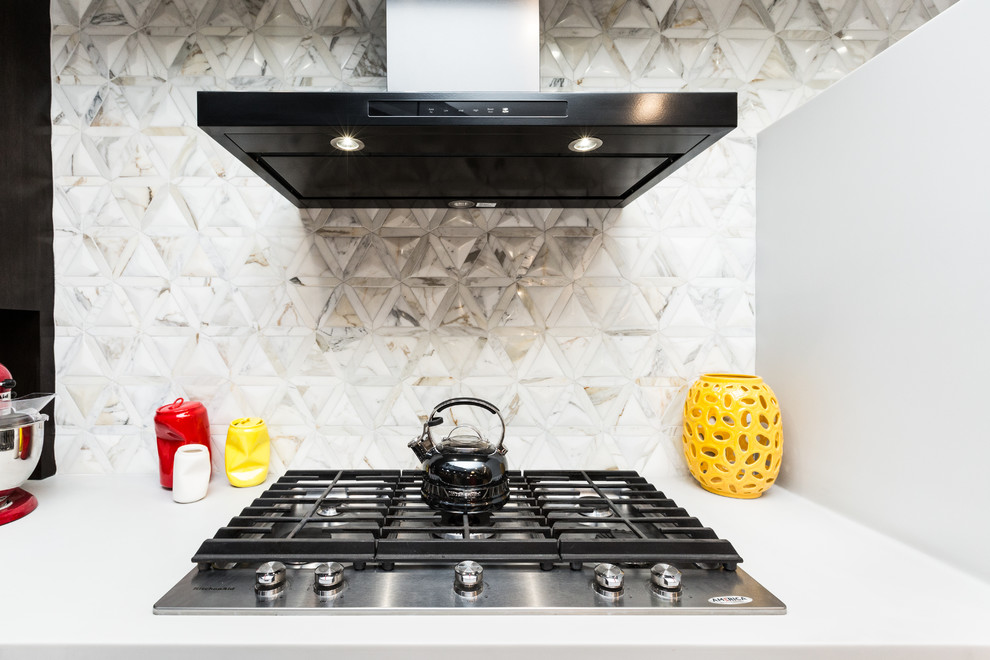 Inspiration for a huge transitional limestone floor kitchen remodel in Albuquerque with an undermount sink, white backsplash, glass sheet backsplash and an island
