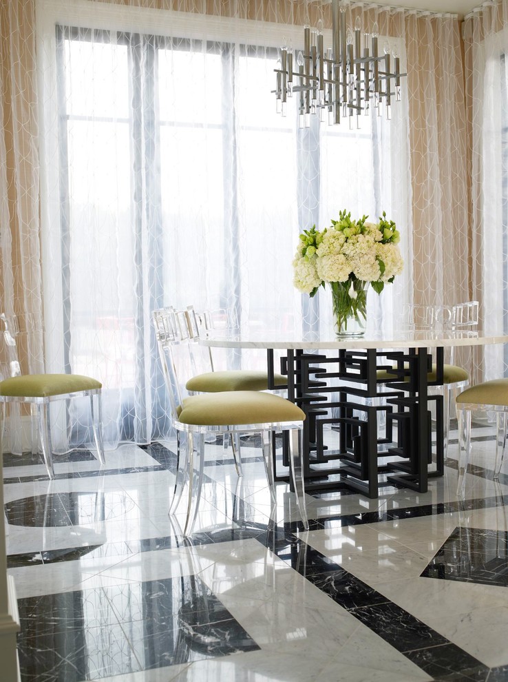 Photo of a mid-sized contemporary dining room in Miami with marble floors and multi-coloured floor.